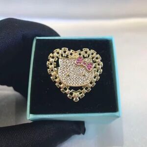 Gold and Pink Heart-Shaped Ring